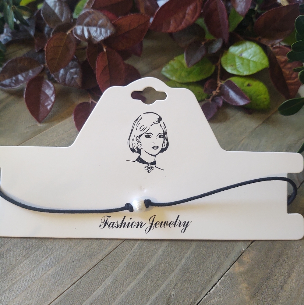 Cultured pearl suede leatherette choker necklace.